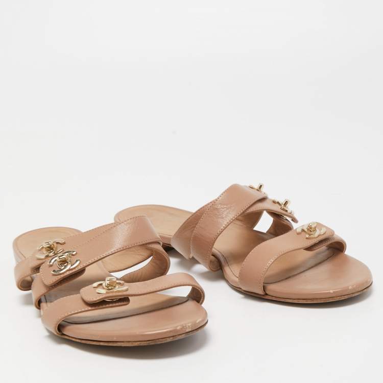 Pre Owned Chanel Beige Leather CC Turnlock Triple Strap Flat Slides Size 39.5