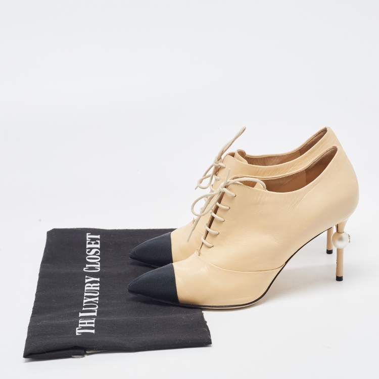 Pre Owned Chanel Beige/Black Leather and Canvas CC Faux Pearl Lace Up Booties Size 40