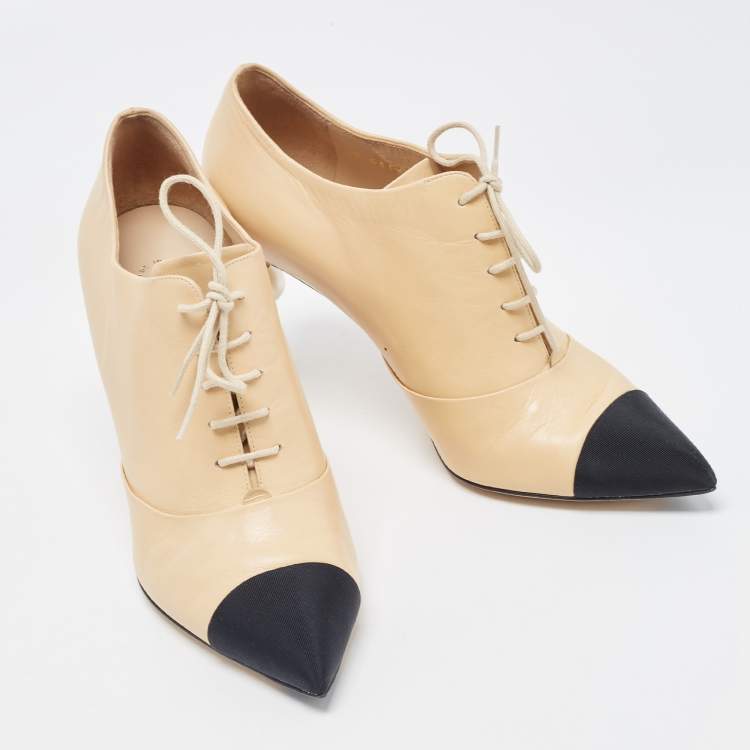 Pre Owned Chanel Beige/Black Leather and Canvas CC Faux Pearl Lace Up Booties Size 40