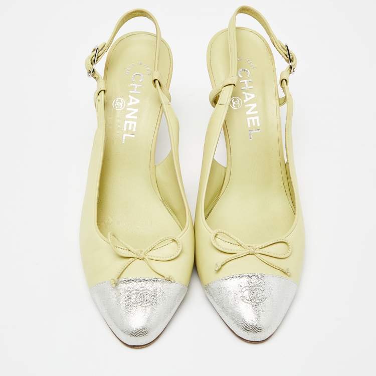 Pre Owned Chanel Yellow/Silver Leather and Laminated Suede CC Cap Toe Bow Slingback Pumps Size 38.5