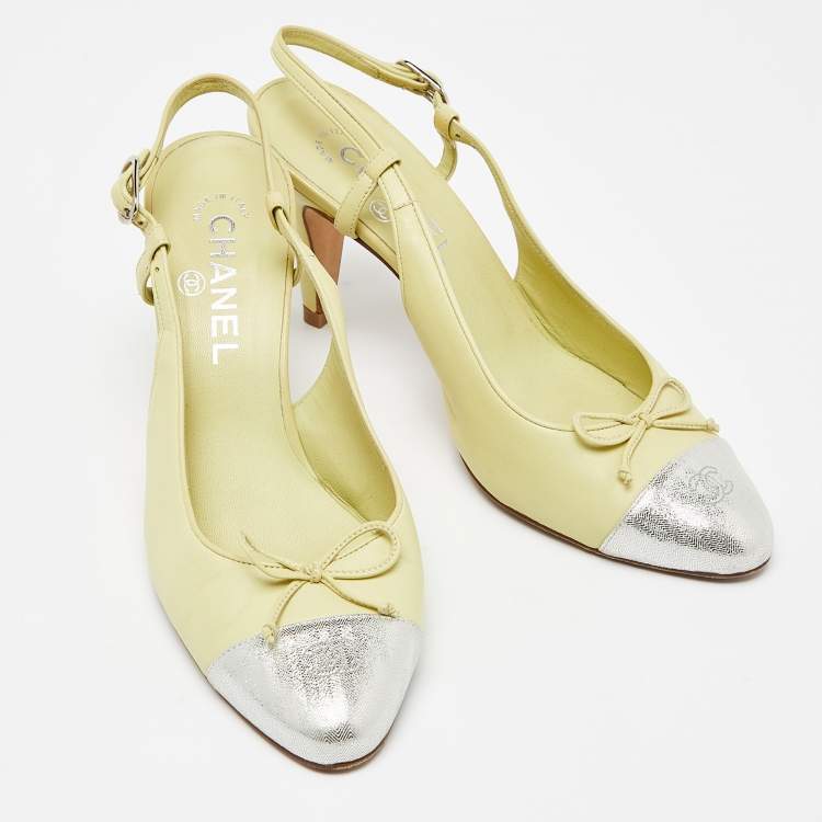 Pre Owned Chanel Yellow/Silver Leather and Laminated Suede CC Cap Toe Bow Slingback Pumps Size 38.5