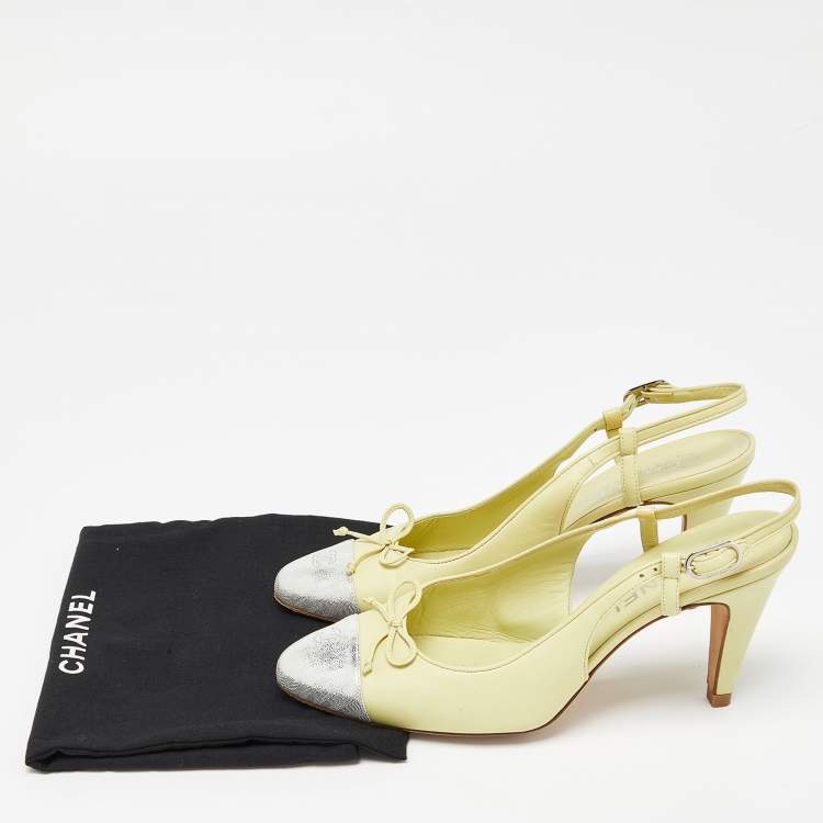 Pre Owned Chanel Yellow/Silver Leather and Laminated Suede CC Cap Toe Bow Slingback Pumps Size 38.5