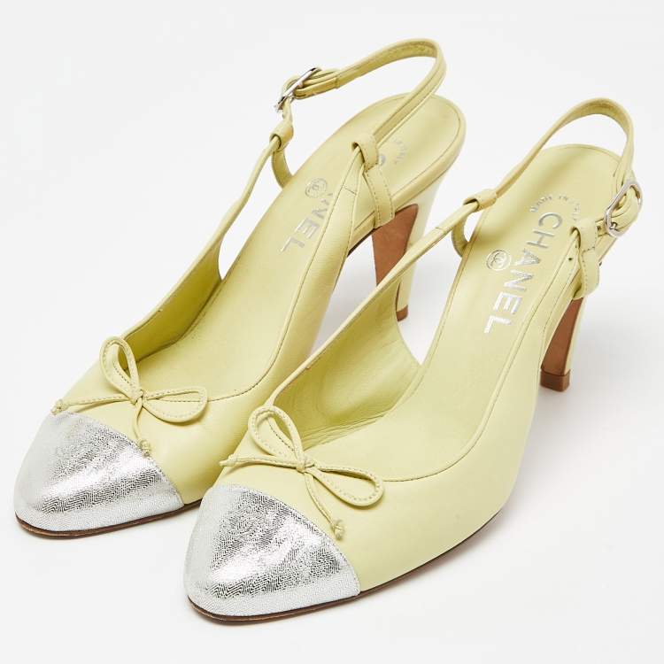 Pre Owned Chanel Yellow/Silver Leather and Laminated Suede CC Cap Toe Bow Slingback Pumps Size 38.5