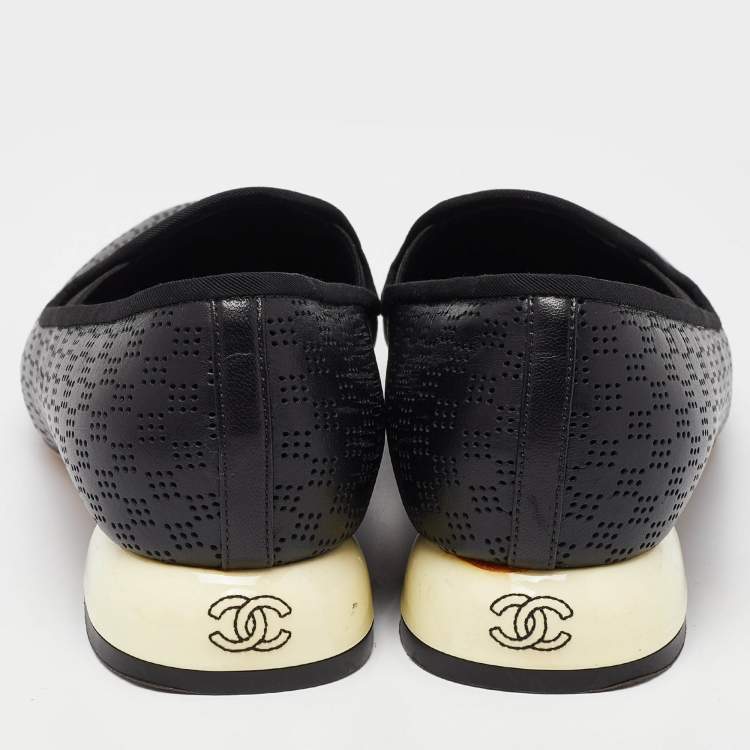 Pre Owned Chanel Black Perforated Leather CC Slip On Loafers Size 38.5
