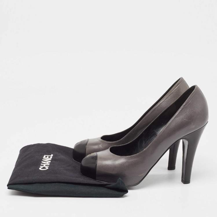 Pre Owned Chanel Grey/Black Leather Cap Toe Pumps Size 37.5