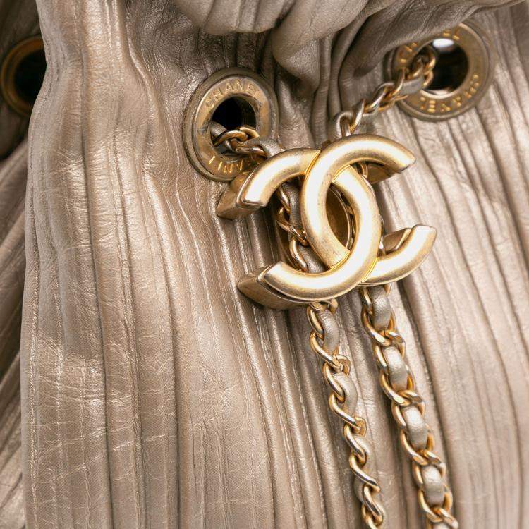 Pre Owned Chanel Gold Small Metallic Calfskin Coco Pleats Drawstring Backpack