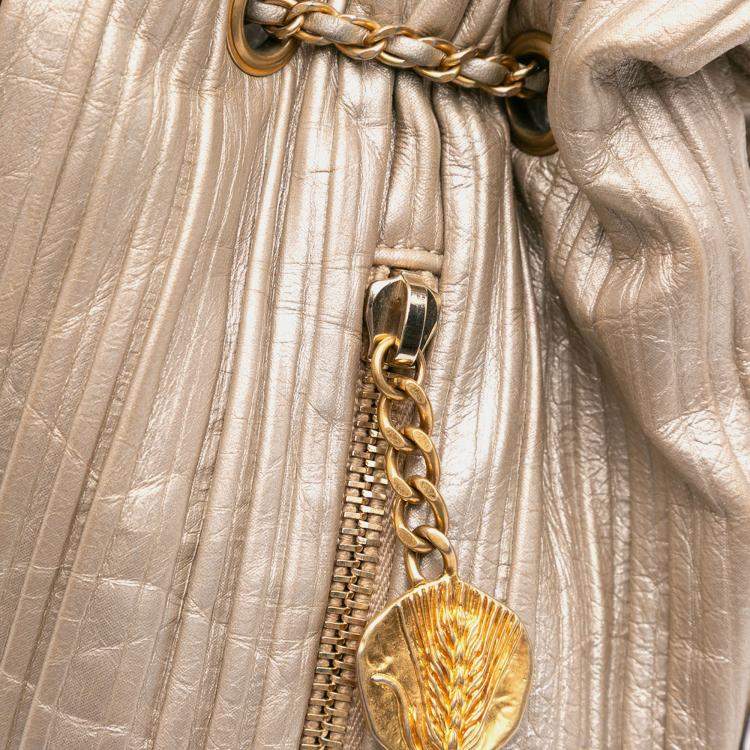 Pre Owned Chanel Gold Small Metallic Calfskin Coco Pleats Drawstring Backpack