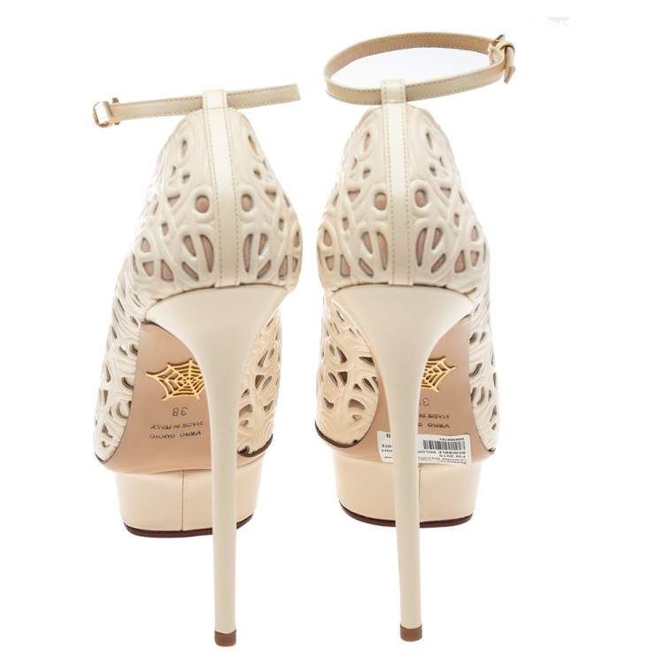 Pre Owned Charlotte Olympia Cream Cut Out Leather Scribble Dolores Ankle Strap Platform Pumps Size 38