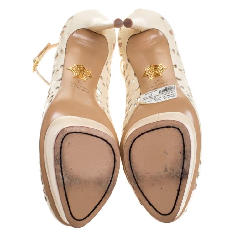 Pre Owned Charlotte Olympia Cream Cut Out Leather Scribble Dolores Ankle Strap Platform Pumps Size 41