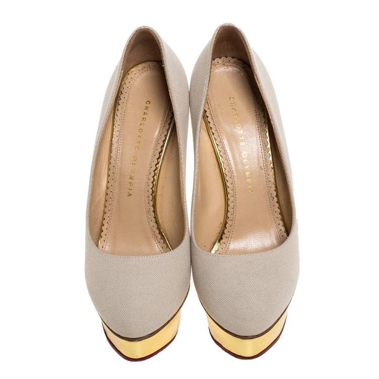 مملوكة مسبقًا Charlotte Olympia Beige Canvas Dolly Platform Pumps Size 39