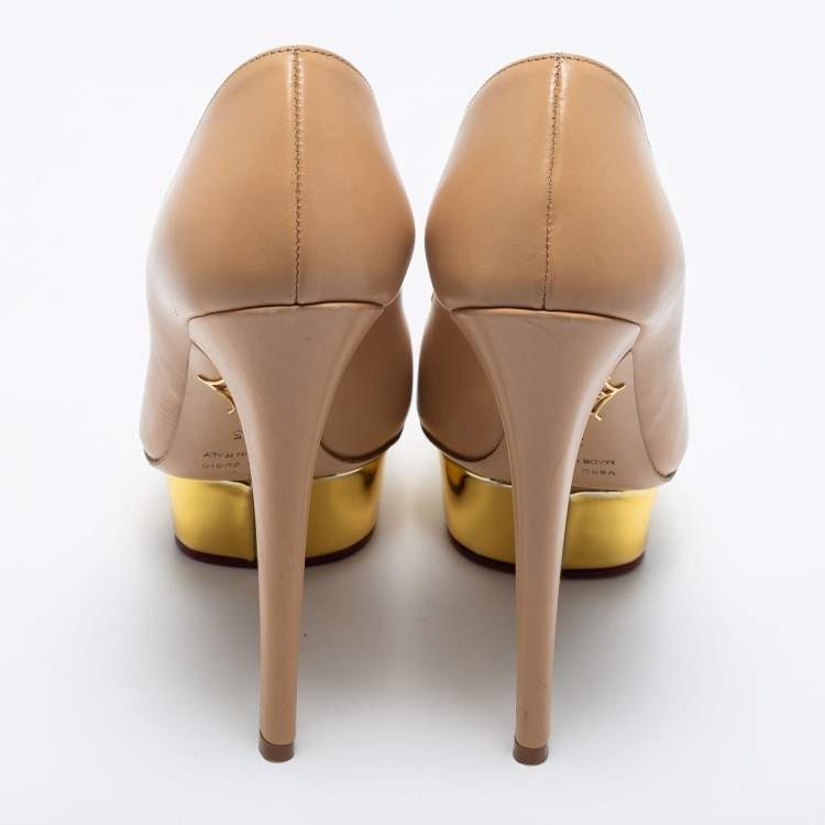 مملوكة مسبقًا Charlotte Olympia Beige Leather Daphne Platform Pumps Size 35