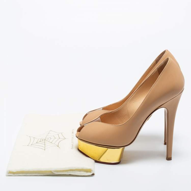 مملوكة مسبقًا Charlotte Olympia Beige Leather Daphne Platform Pumps Size 35