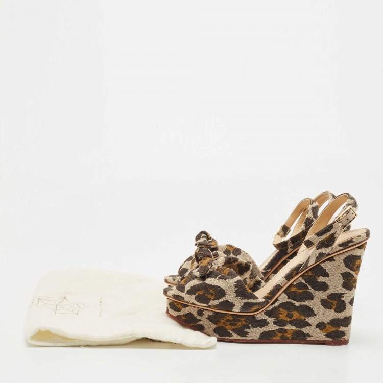 Pre Owned Charlotte Olympia Beige/Brown Leopard Canvas Bow Platform Ankle Strap Wedge Sandals Size 38.5