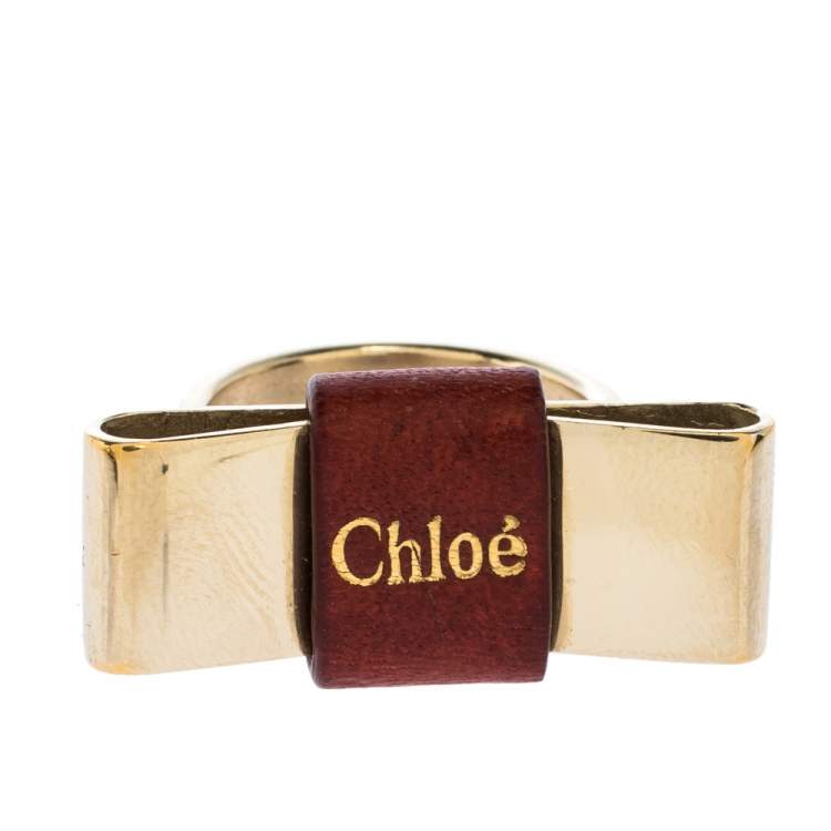 Pre Owned Chloe Leather Bow Motif Gold Tone Ring Size 54
