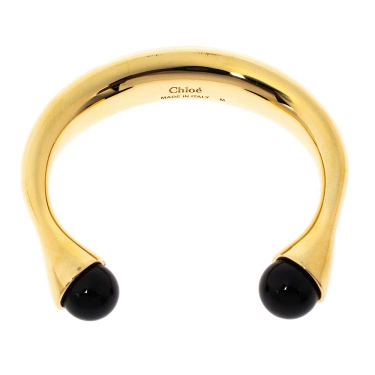 Pre Owned Chloe Darcey Black Bead Gold Tone Open Cuff Bracelet M
