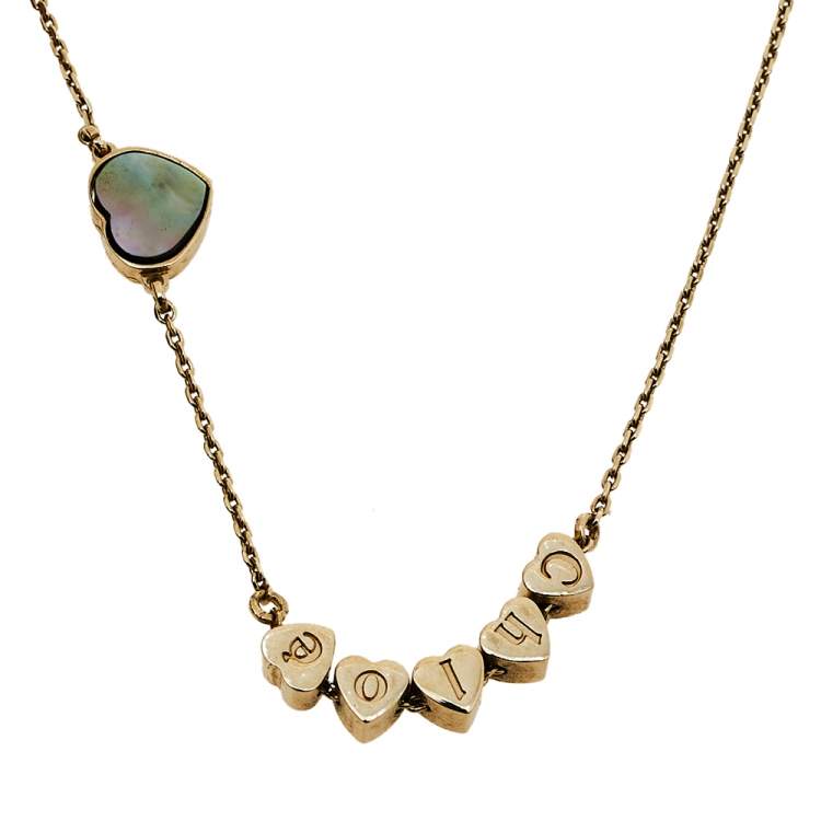 مملوكة مسبقًا Chloé Gold Tone Logo Charms Mother of Pearl Heart Necklace 