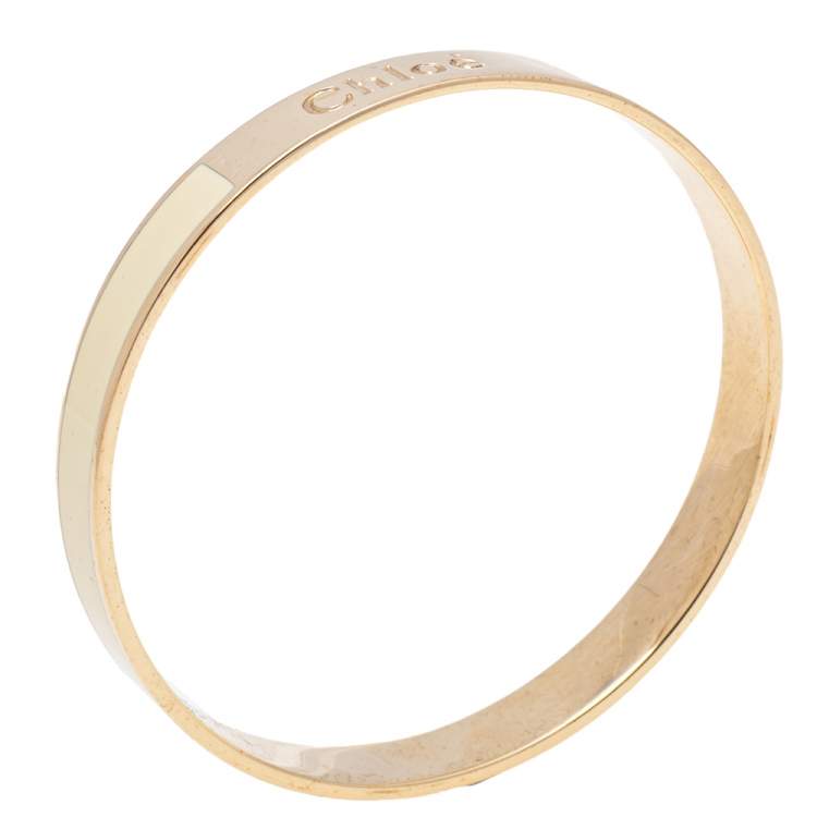 Pre Owned Chloé Holly Enamel Gold Tone Metal Bangle Bracelet 