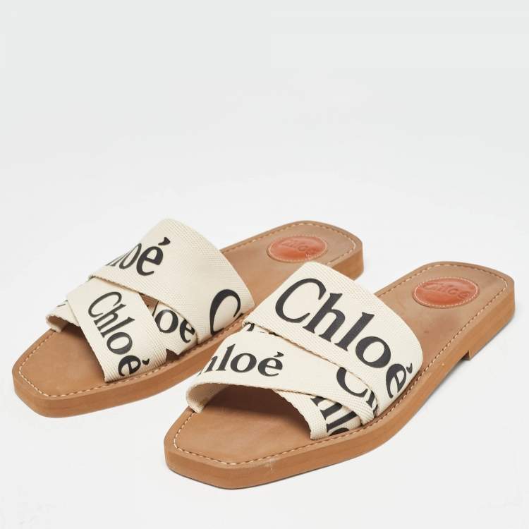 Pre Owned Chloé Off White Logo Canvas Woody Flat Slides Size 39