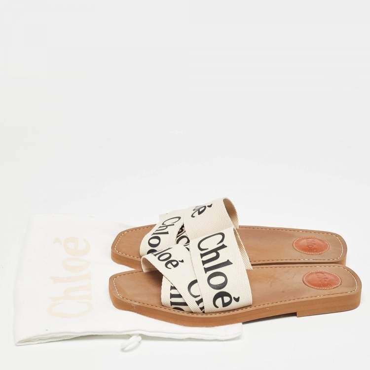 Pre Owned Chloé Off White Logo Canvas Woody Flat Slides Size 39