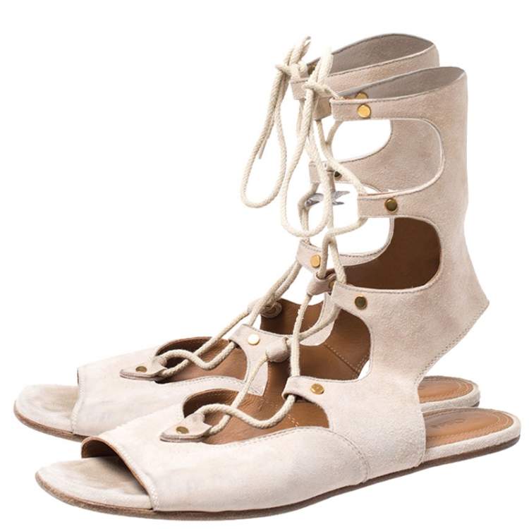 مملوكة مسبقًا Chloe Beige Suede Gladiator Ankle Wrap Flap Sandals Size 38.5