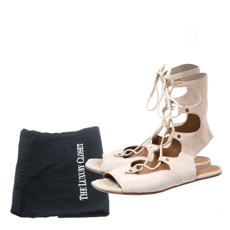 مملوكة مسبقًا Chloe Beige Suede Gladiator Ankle Wrap Flap Sandals Size 38.5