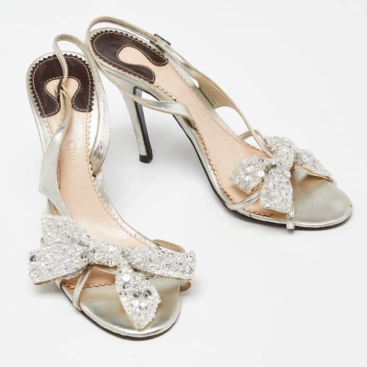 Pre Owned Chloe Silver Leather Crystal Embellished Bow Detail Ankle Strap Sandals Size 37.5