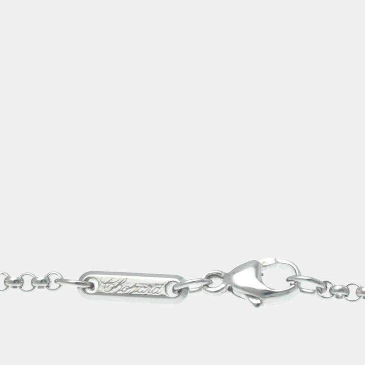 Pre Owned Chopard 18K White Gold, Diamond and Sapphire Happy Diamond Cross Pendant Necklace