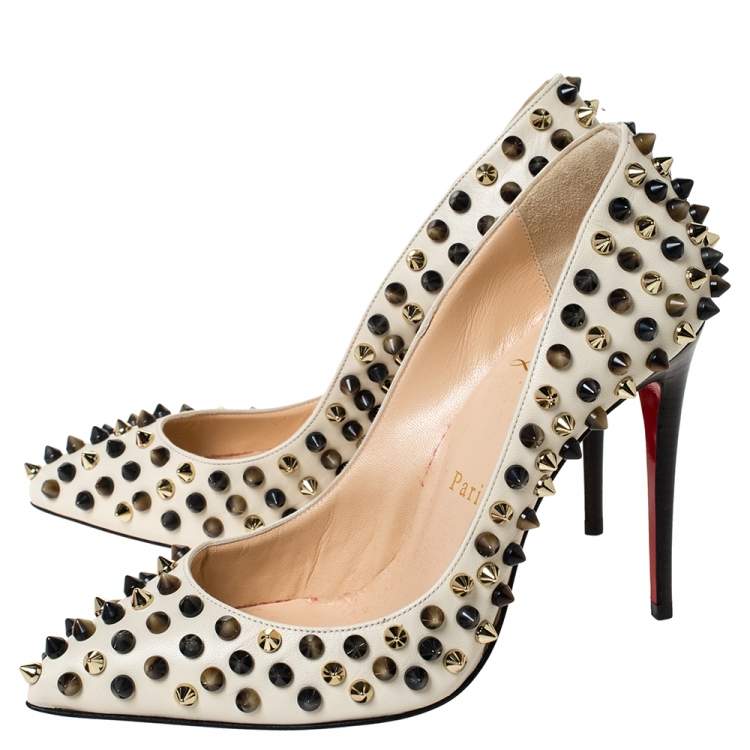 Pre Owned Christian Louboutin Cream Leather Follies Spikes Pumps Size 35