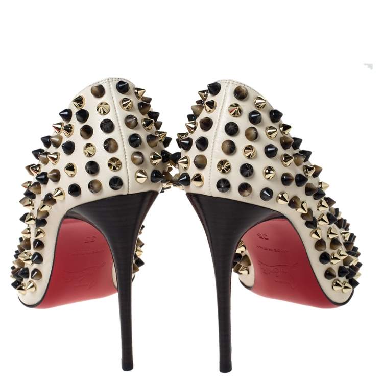 Pre Owned Christian Louboutin Cream Leather Follies Spikes Pumps Size 35