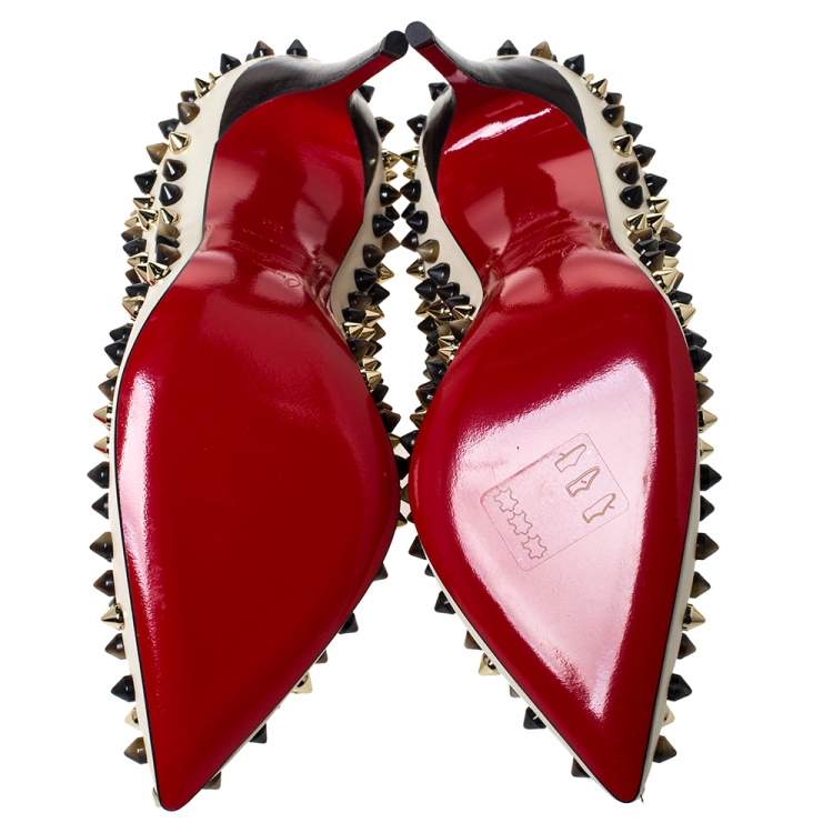 Pre Owned Christian Louboutin Cream Leather Follies Spikes Pumps Size 35