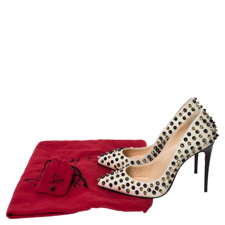 Pre Owned Christian Louboutin Cream Leather Follies Spikes Pumps Size 35