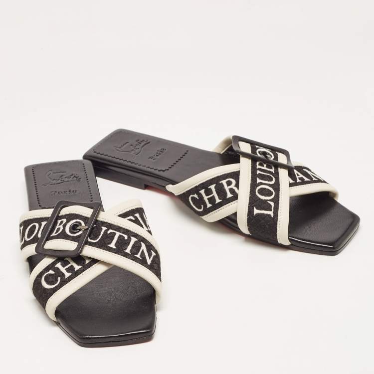 Pre Owned Christian Louboutin Black/White Logo Canvas and Leather Crossimule Flat Slides Size 38.5