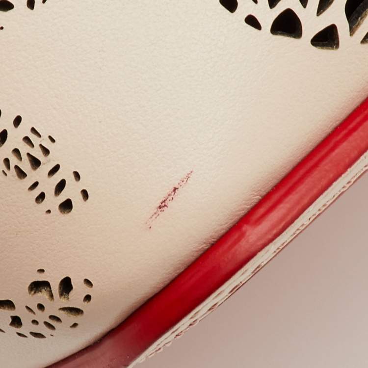 Pre Owned Christian Louboutin Cabata Small Beige Perforated Leather Spikes Shopper Tote