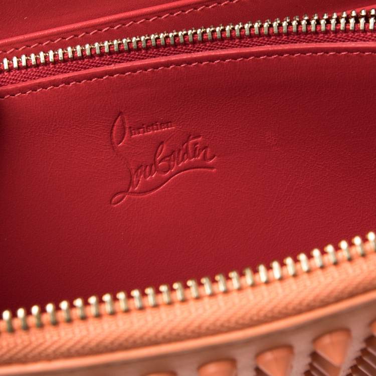Pre Owned Christian Louboutin Coral Orange Leather Spikes Panettone Zip Around Wallet