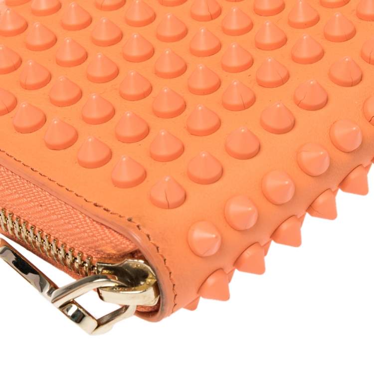 Pre Owned Christian Louboutin Coral Orange Leather Spikes Panettone Zip Around Wallet