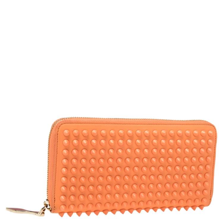 Pre Owned Christian Louboutin Coral Orange Leather Spikes Panettone Zip Around Wallet