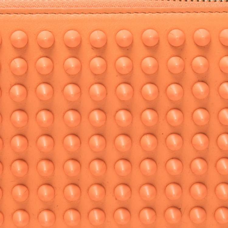 Pre Owned Christian Louboutin Coral Orange Leather Spikes Panettone Zip Around Wallet