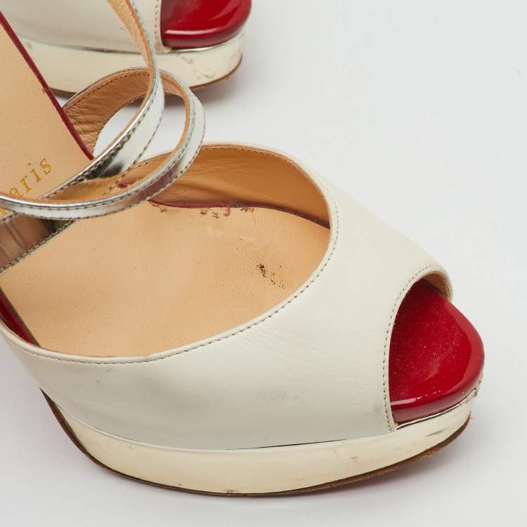 Pre Owned Christian Louboutin Multicolor Python and Leather Crisscross Peep Toe Platform Pumps Size 38