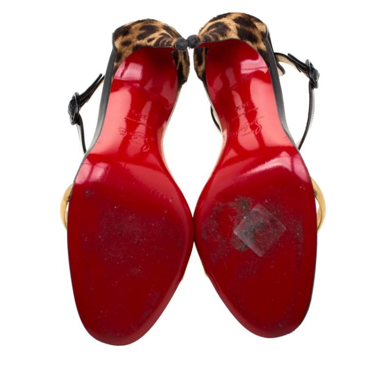 Pre Owned Christian Louboutin Leopard Print Pony Hair And Patent Leather Athena Alta T-Strap Open Toe Sandals Size 38.5