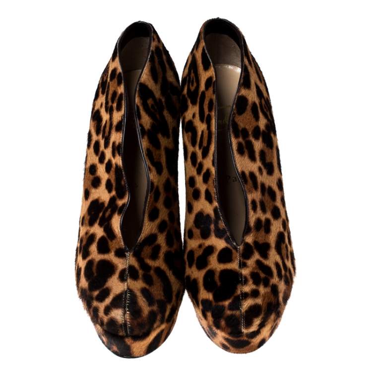 مملوكة مسبقًا Christian Louboutin Brown/Beige Leopard Print Pony Hair Platform Booties Size 37