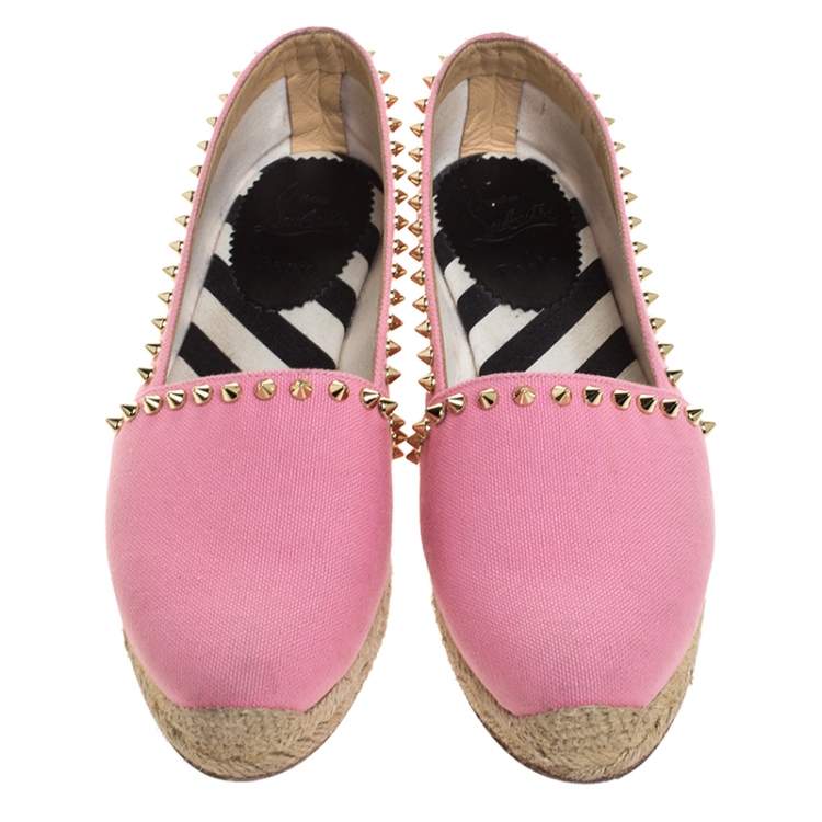 pink spiked loafers