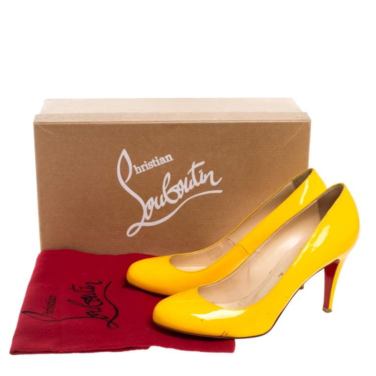 christian louboutin yellow pumps