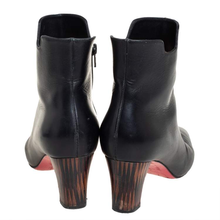 مملوكة مسبقًا Christian Louboutin Black Leather Tiagada Ankle Boots Size 40.5