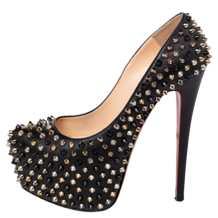 Louboutin gold best sale spiked heels