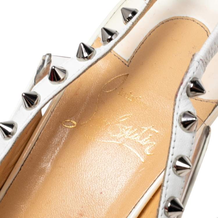 Pre Owned Christian Louboutin Off-White Patent Leather and PVC Brigandine Spike Slingback Pumps Size 38