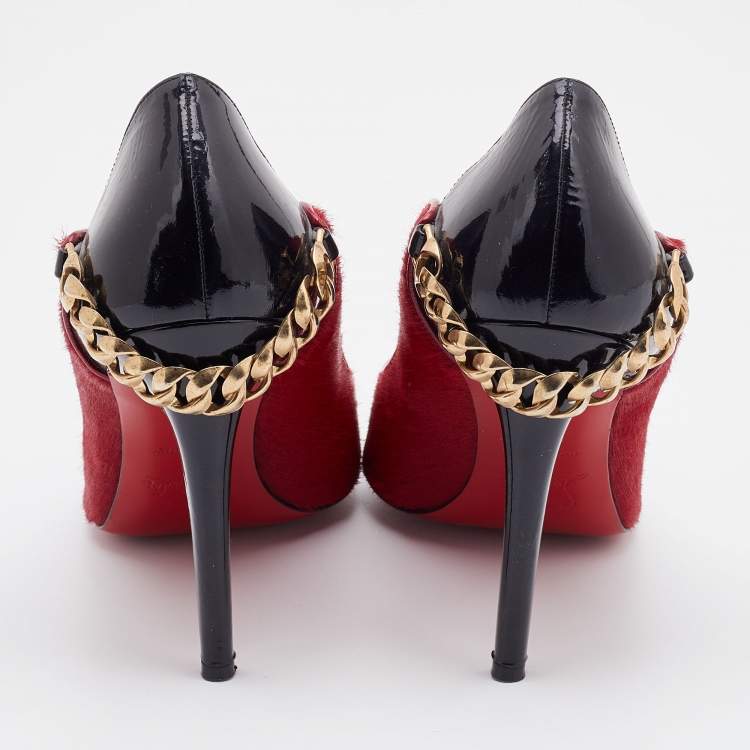 Pre Owned Christian Louboutin Red/Black Calf Hair and Patent Leather Dorepi Pumps Size 39