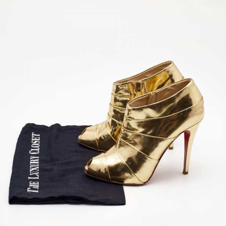 Pre Owned Christian Louboutin Gold Leather Robot Booties Size 39