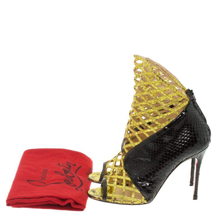 Pre Owned Christian Louboutin Black and Gold Python Bougliona Cage Ankle Boots Size 38.5