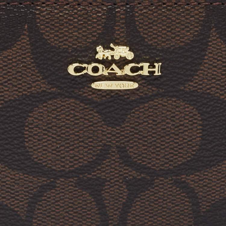 Pre Owned Coach Brown/Black Signature Coated Canvas Compact Wallet