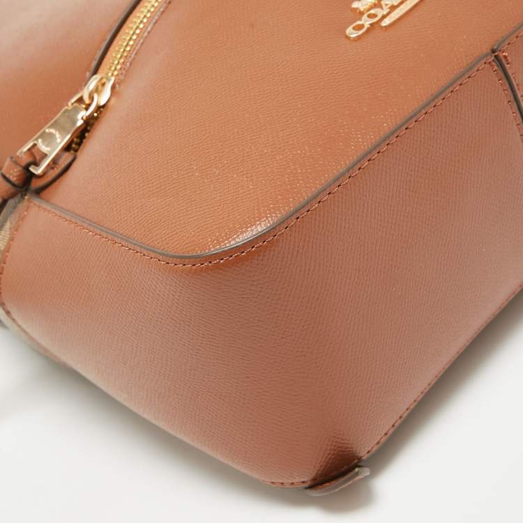 Pre Owned Coach Brown Signature Coated Canvas and Leather Jordyn Backpack
